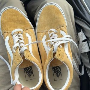 Shoes. Mustard vans.